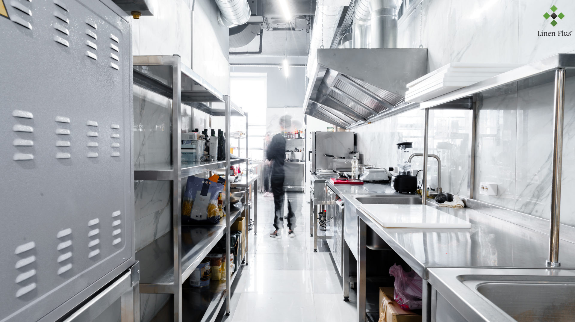 Modern commercial kitchen with stainless appliances